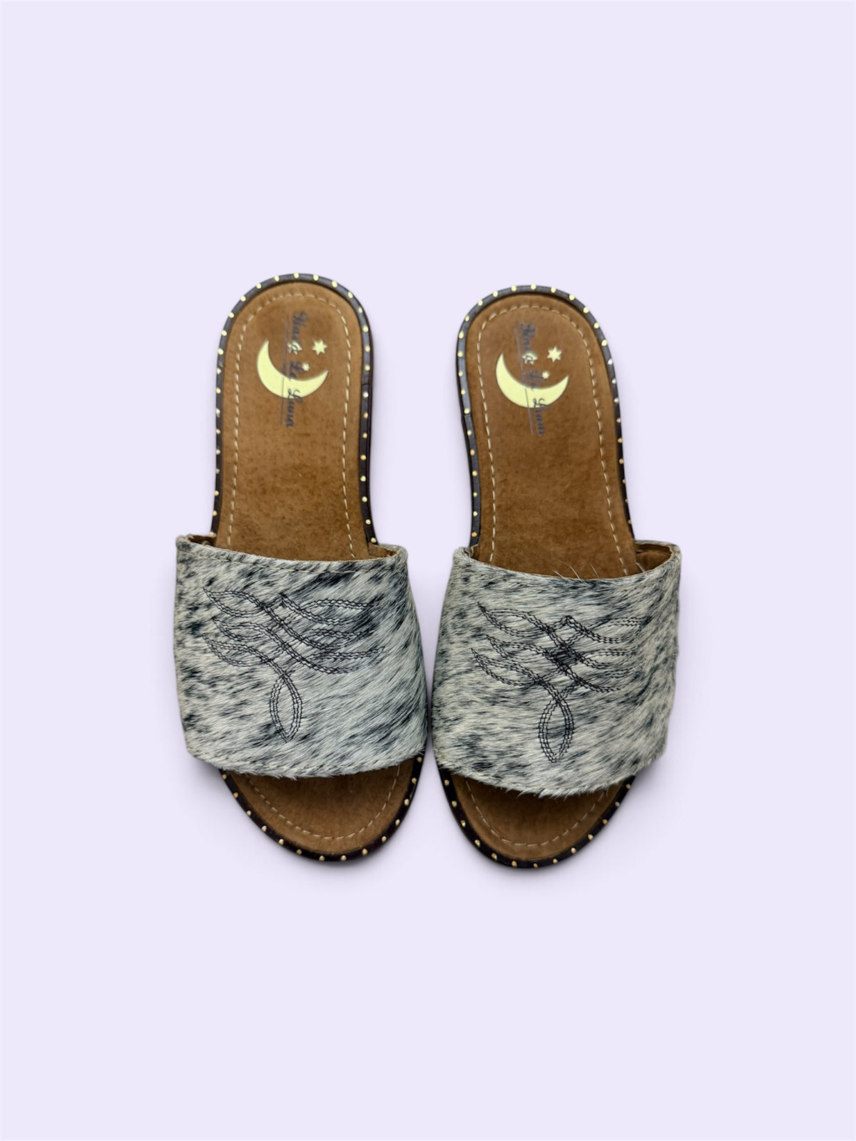White and Black Cowhide Sandals (size 7)