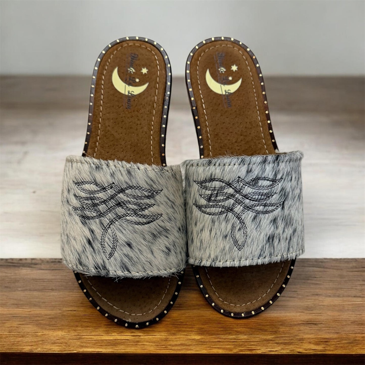 White and Black Cowhide Sandals (size 6)