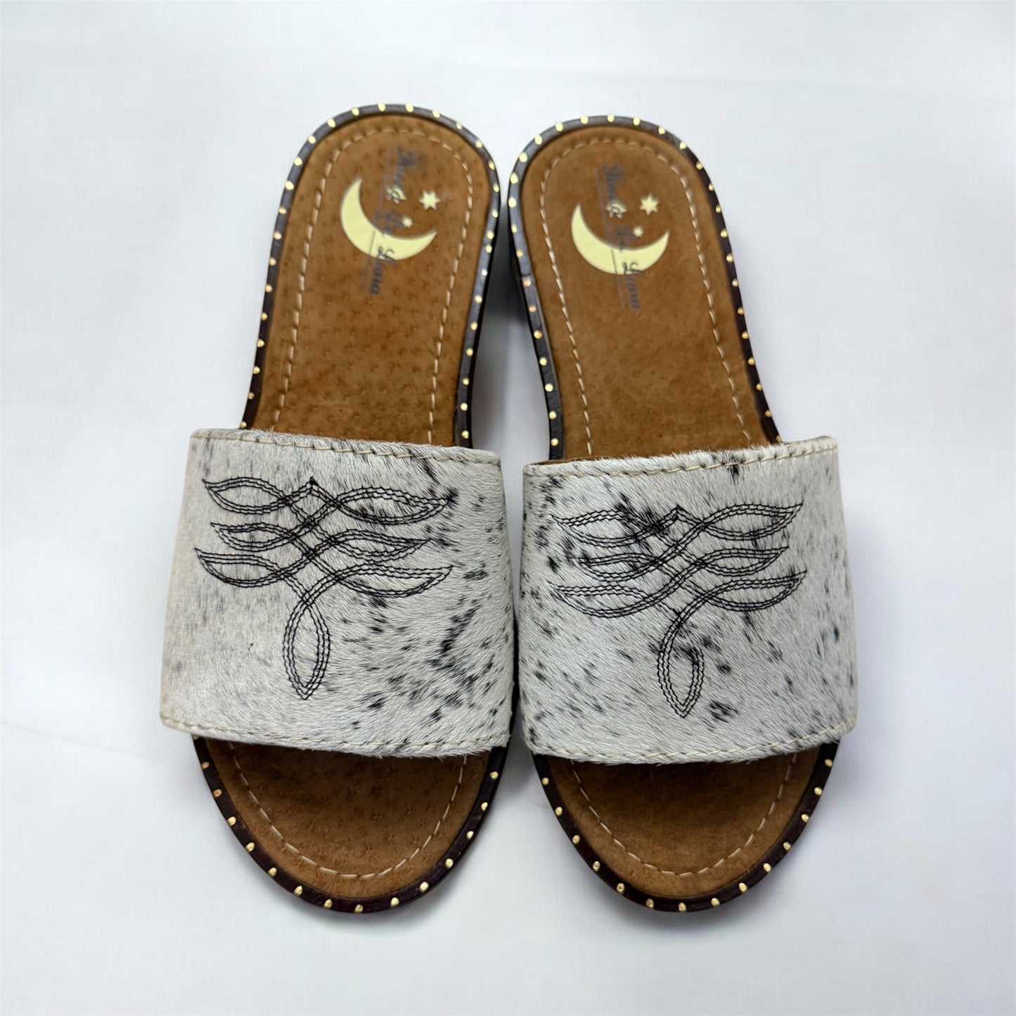White with black cowhide Sandals (size 7)