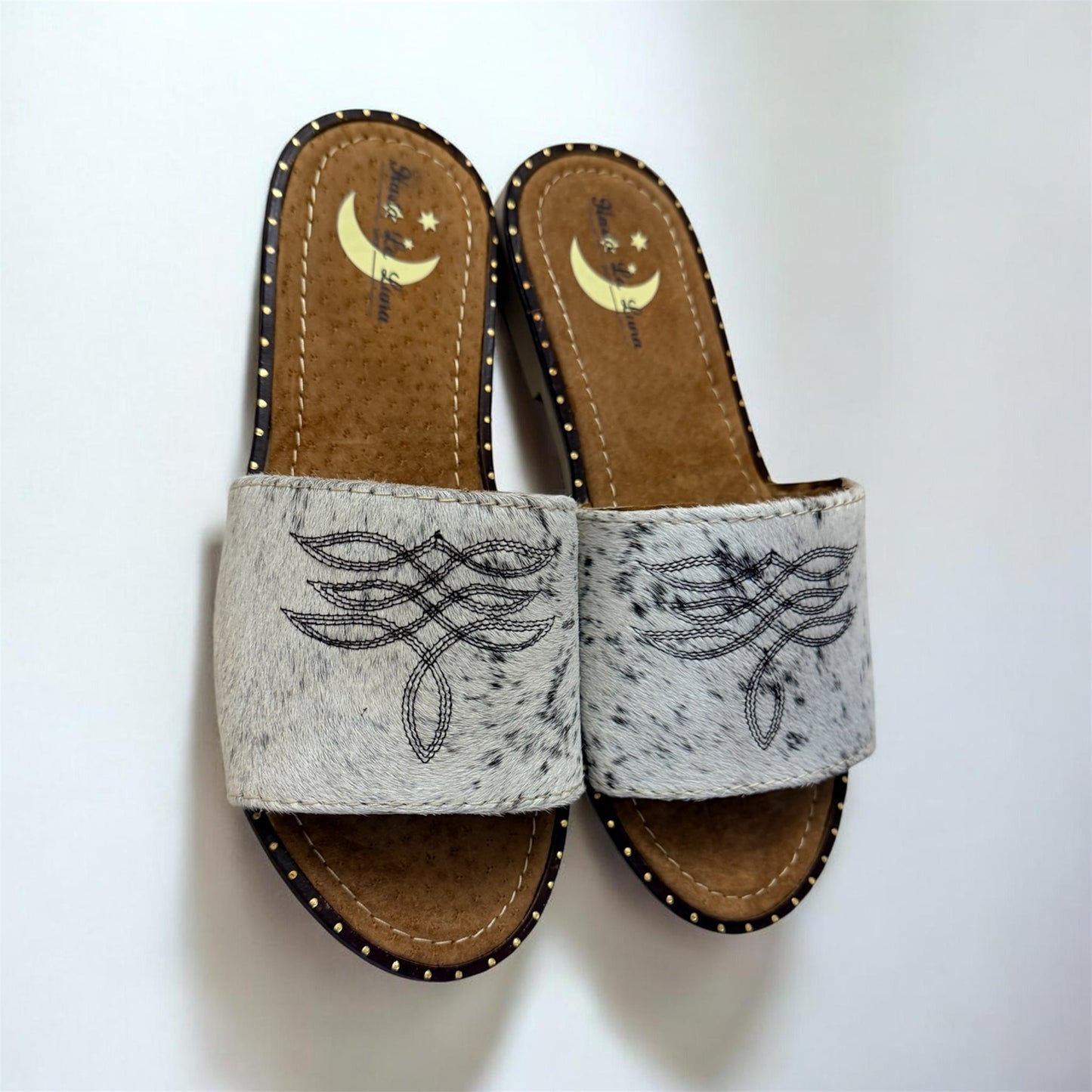 White with black cowhide Sandals (size 7)