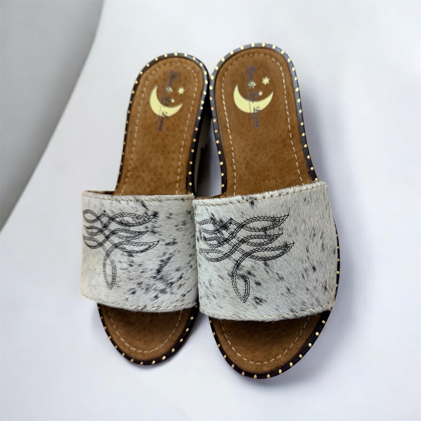 White with black cowhide Sandals (size 7)