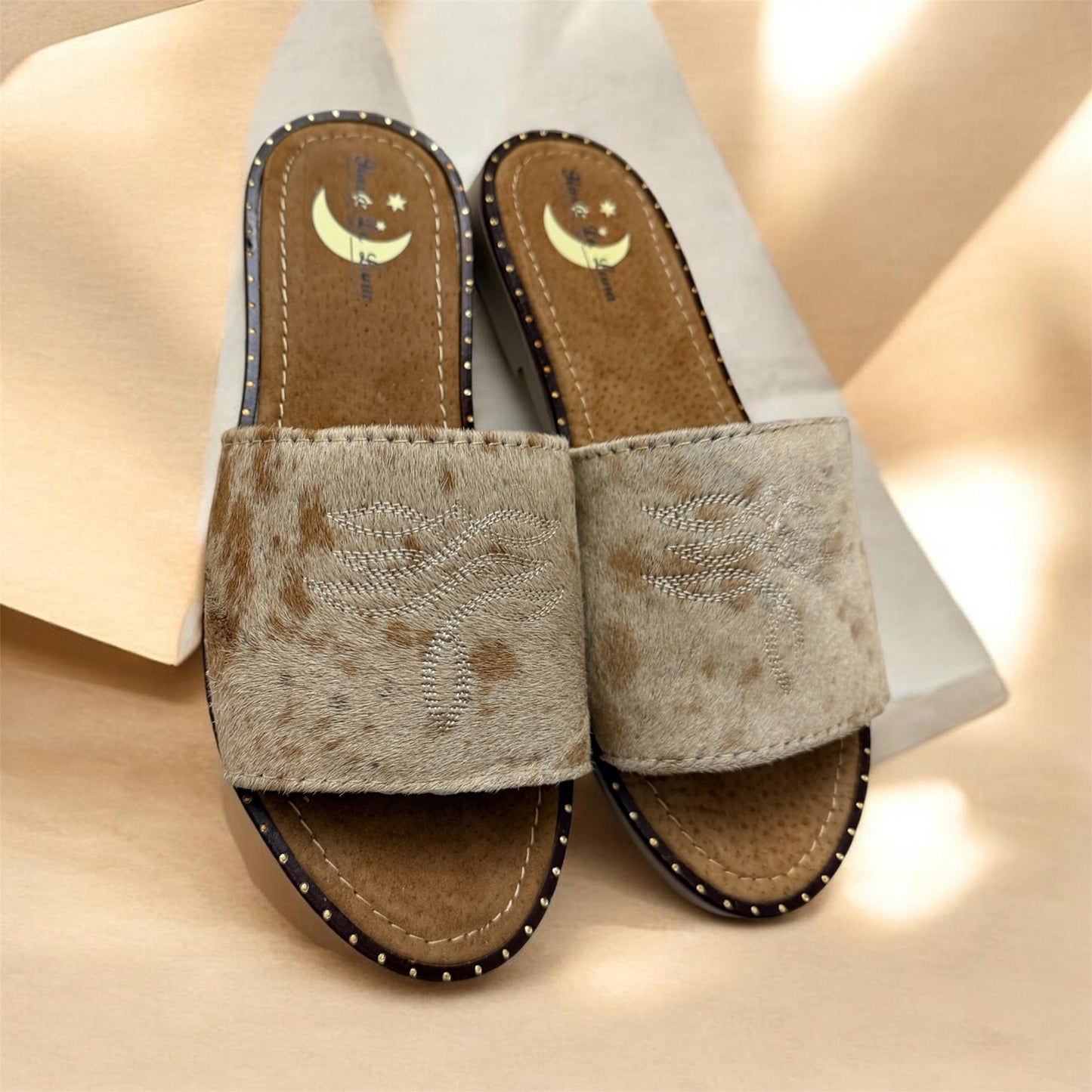 Cream and Brown Cowhide Sandals (size 8)
